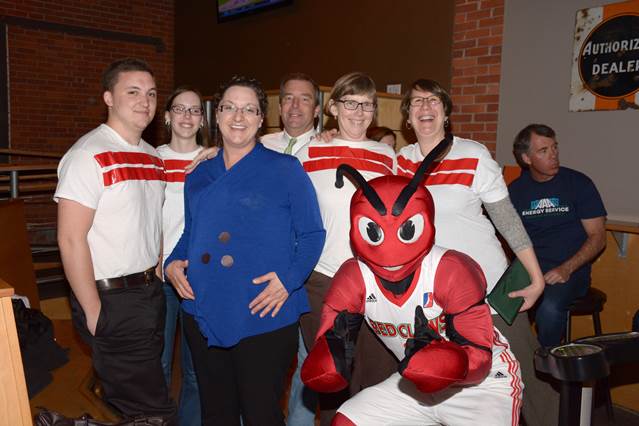 From left, of Bath Savings Institution: Dan Hallinan, Sarah Gagnon, Sarah Piper, Mike Celeste, Julie Wagoner, Theresa Hodge and Crusher of the Maine Red Claws